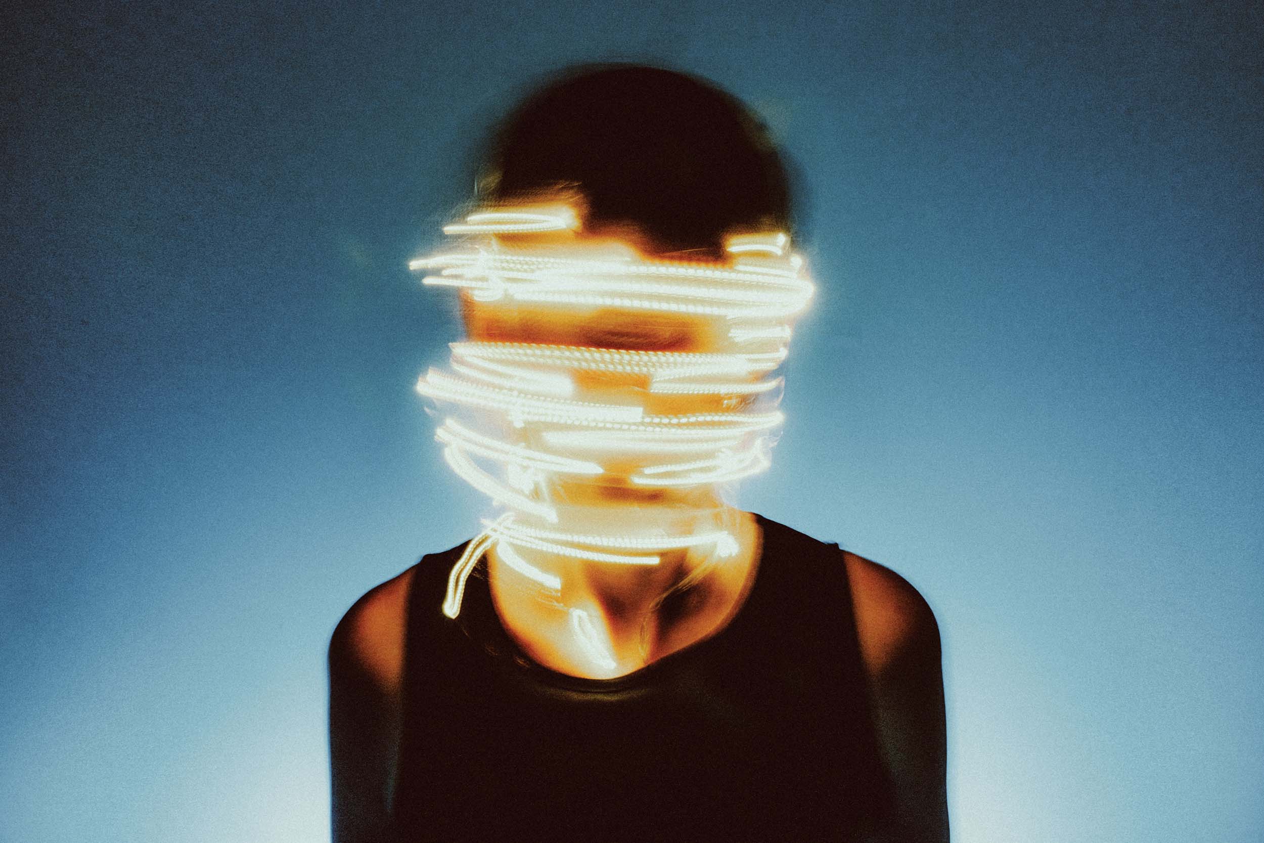 Distorted human face representing fear around autonomous AI agents