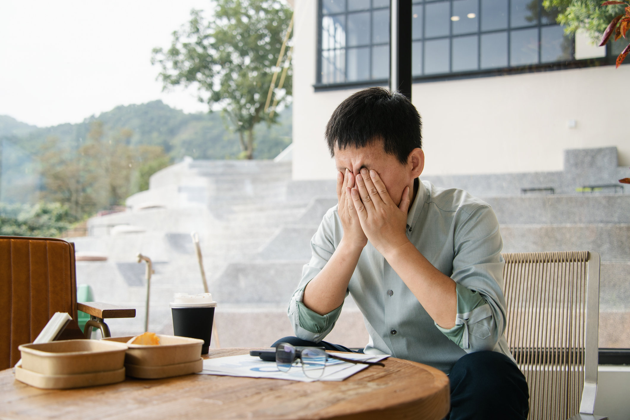 Business owner overwhelmed by decisions flowing through them, representing owner dependency