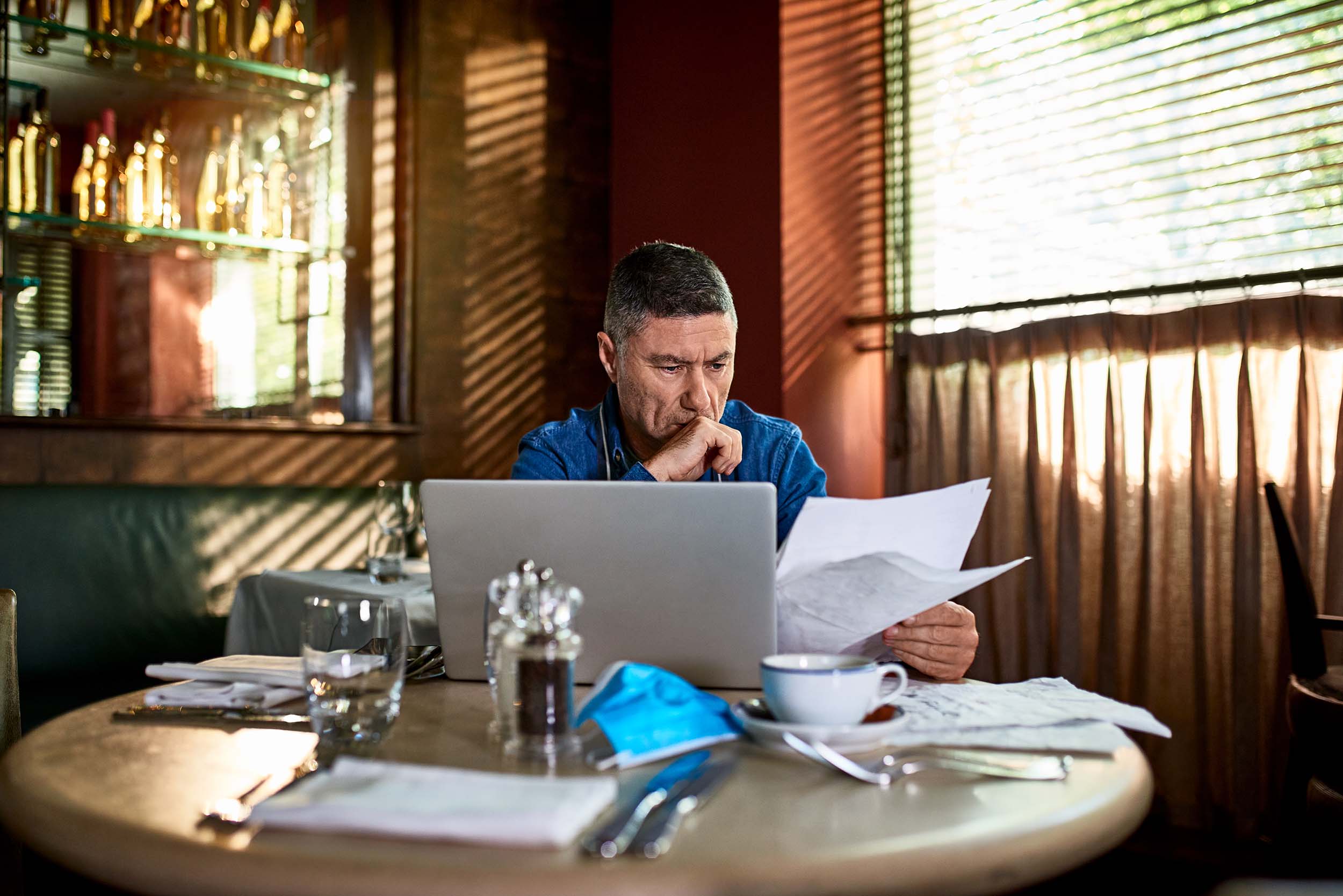 Concerned business owner reviewing AI-generated results at a tax and accounting firm