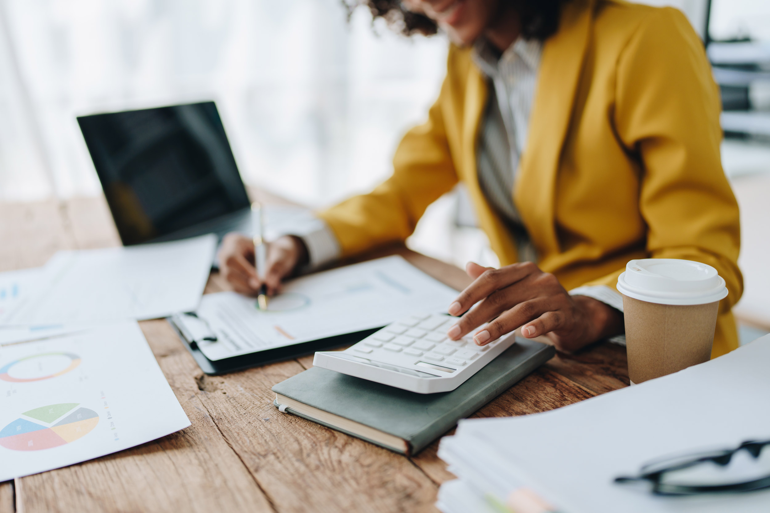 Accountant working at a desk, representing the tax and accounting talent shortage