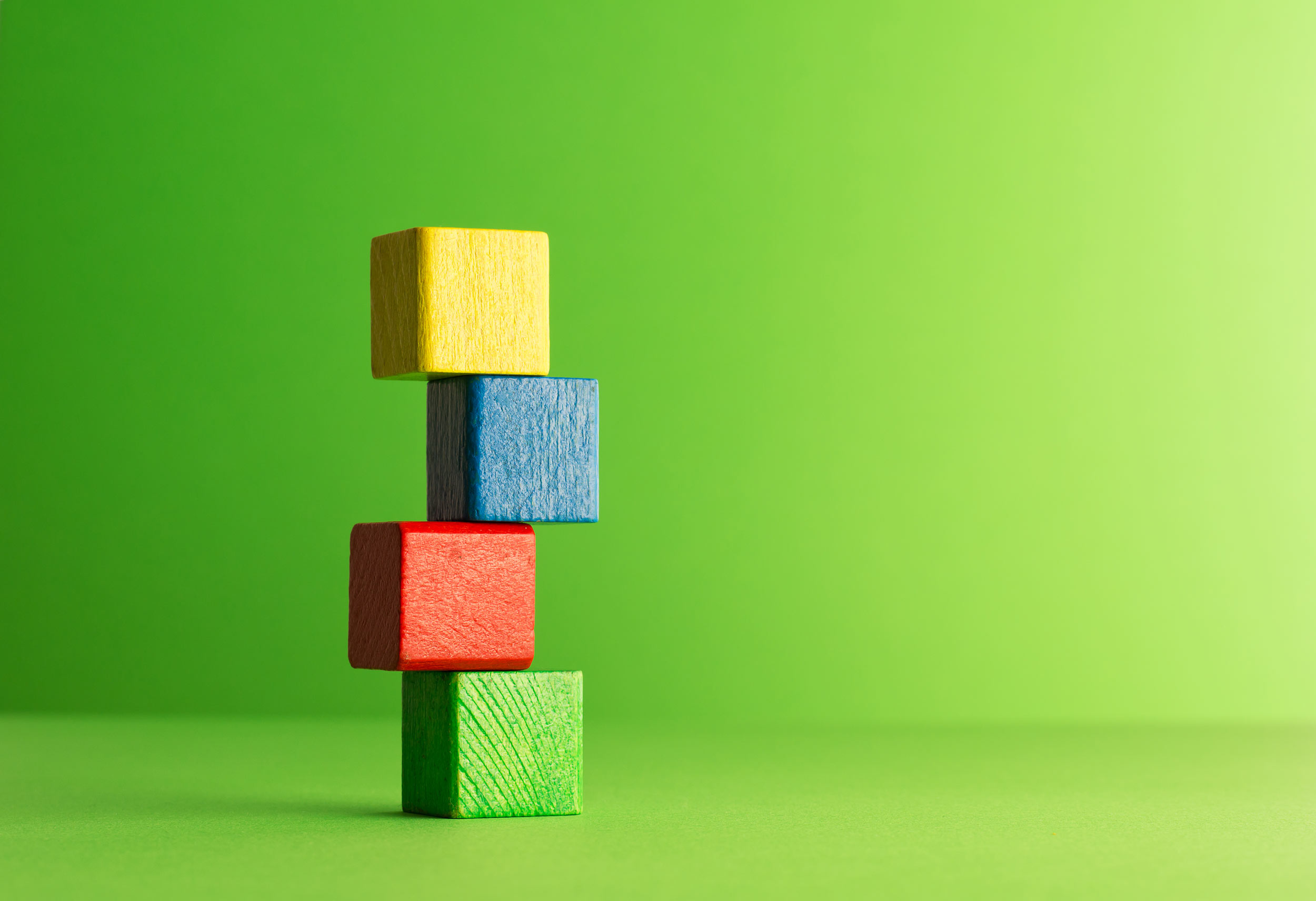 Team of building blocks, representing a firm's competitive moat