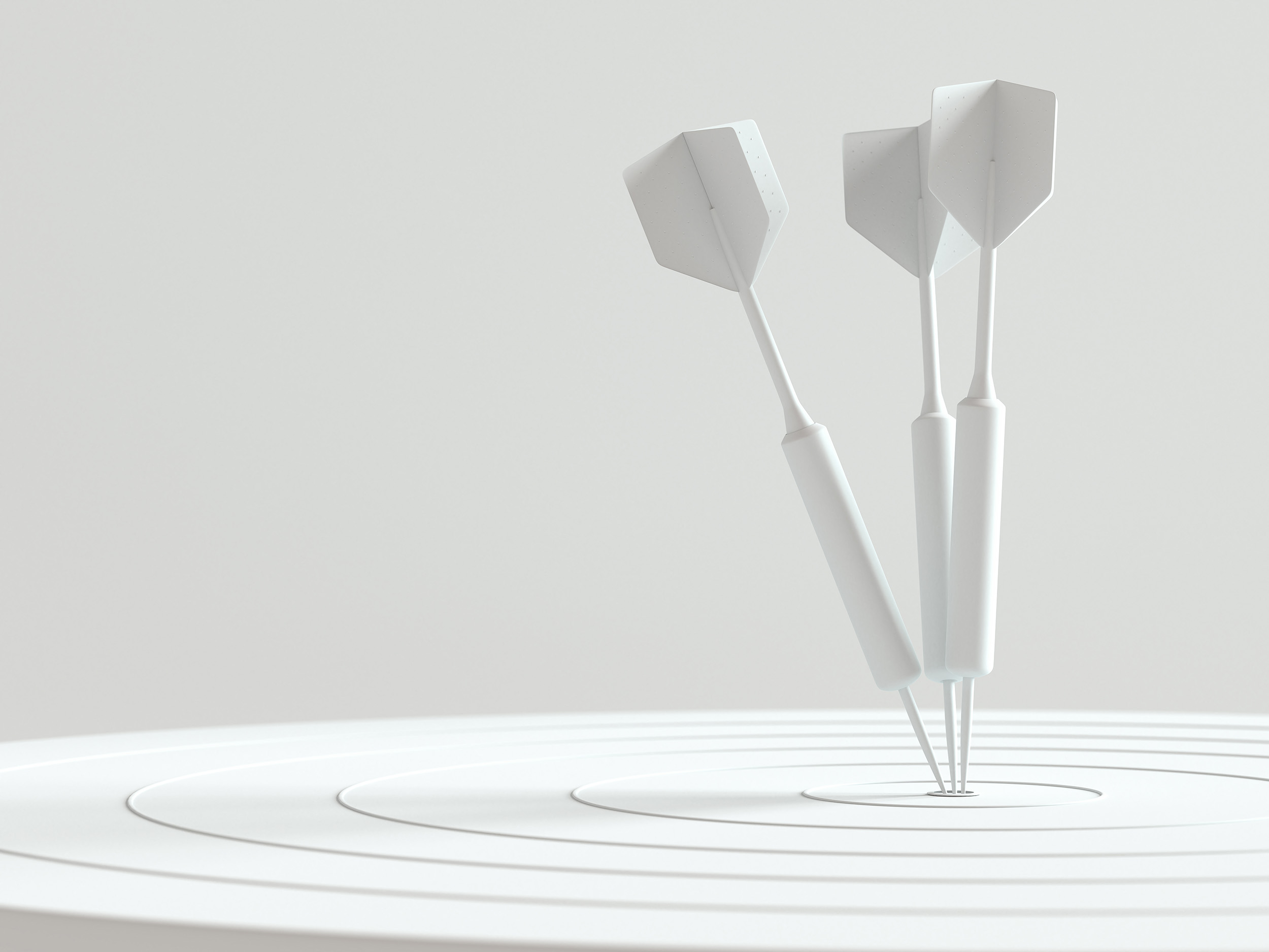 Target with darts, representing a website designed to convert visitors into clients