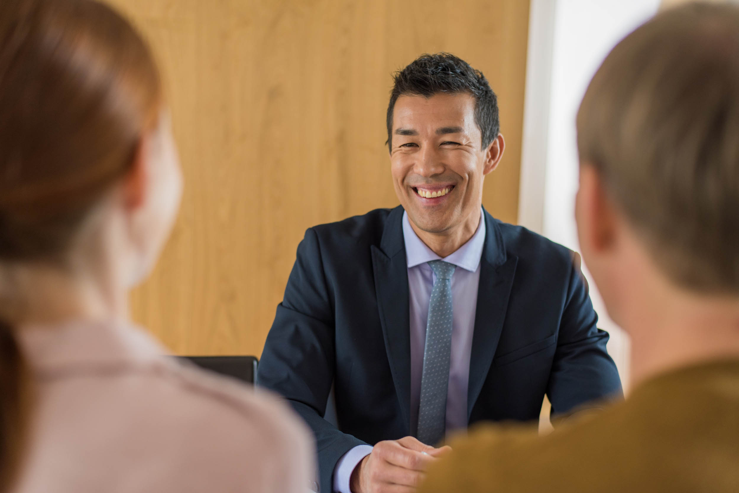 Candid photo of working with clients, representing retention marketing