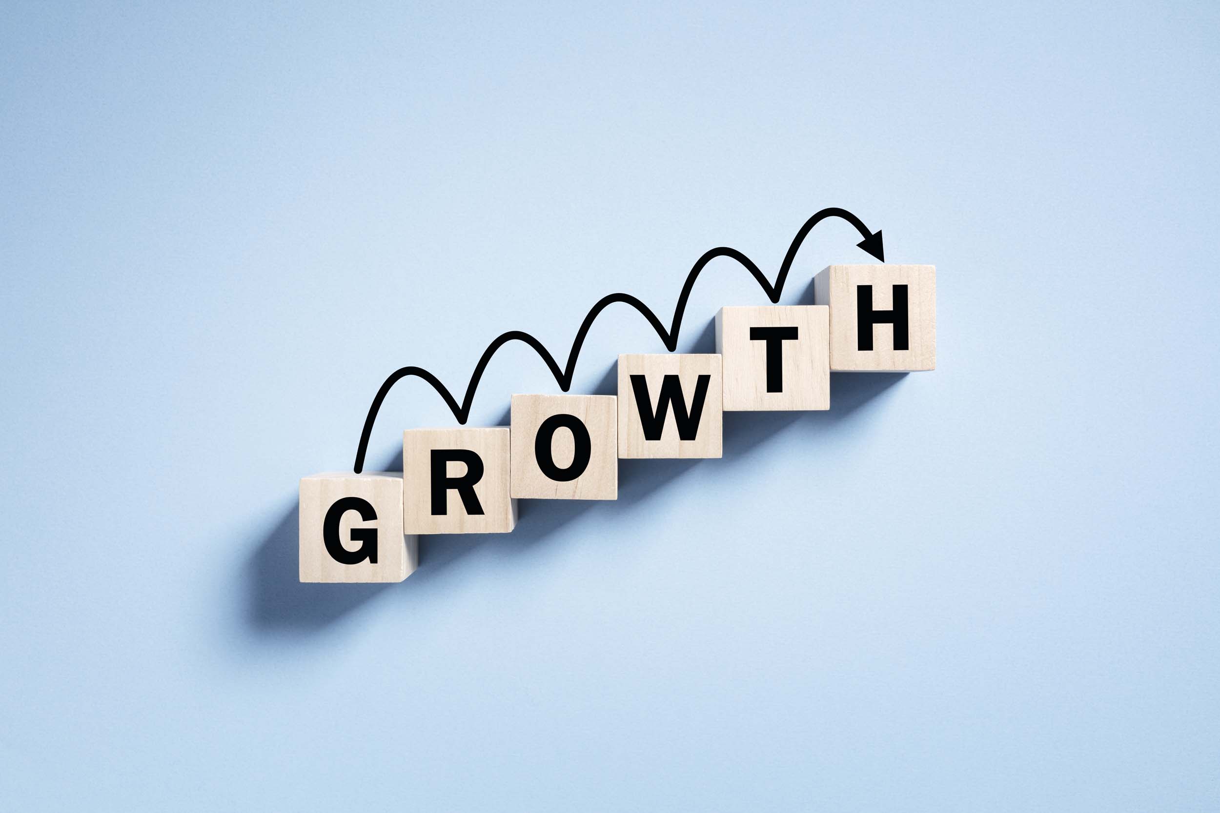 Growth block graphic, representing scaling a firm without added hiring costs