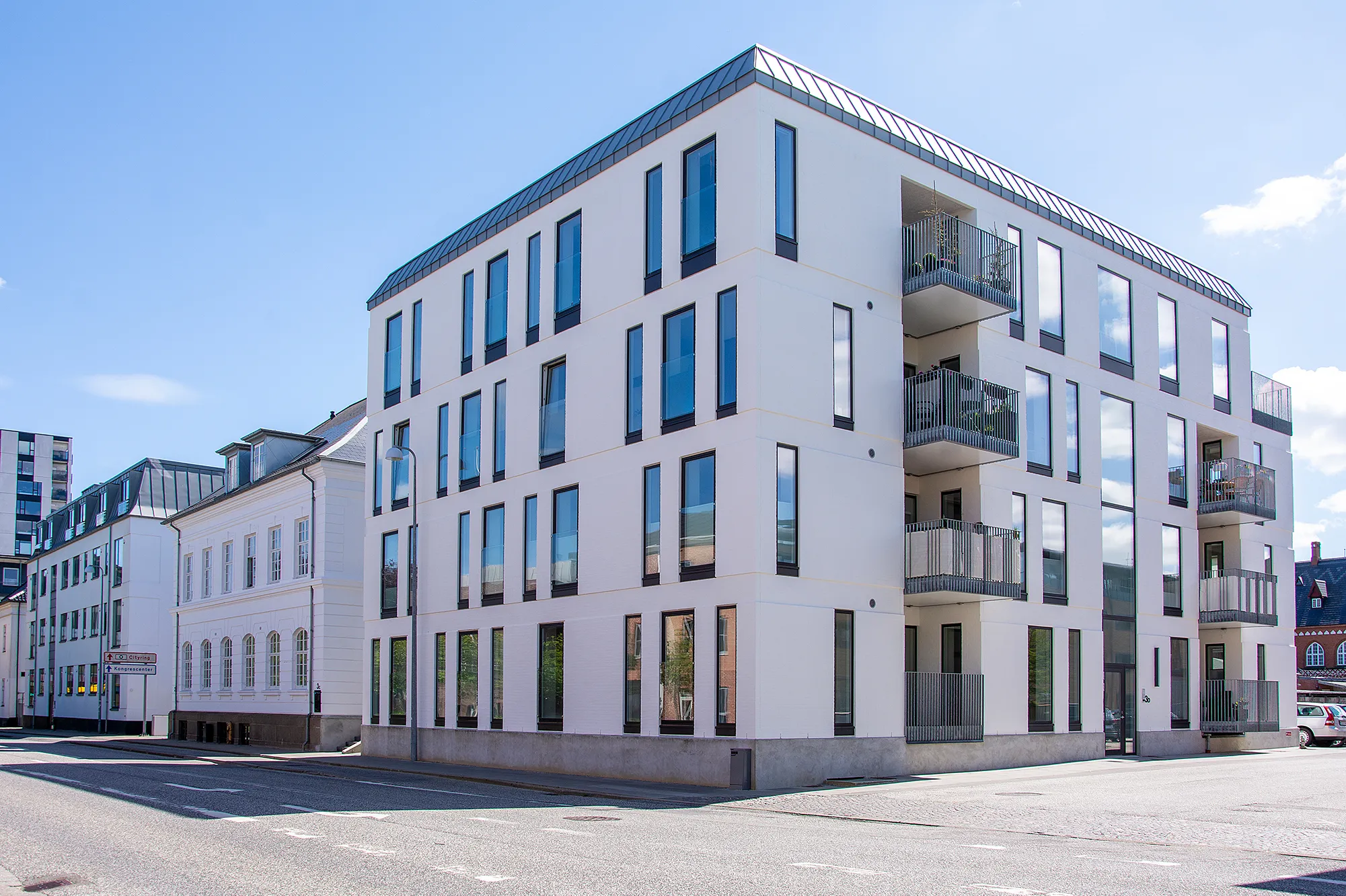 Nygade 3D Herning på en solskinsdag med blå himmel