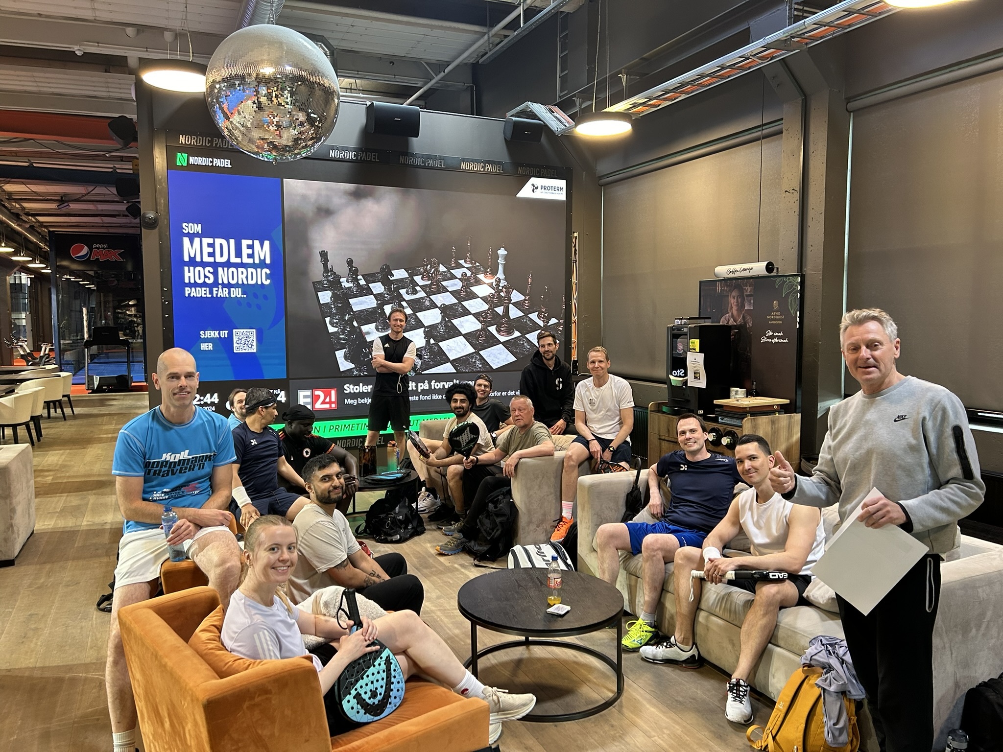 DI colleagues gathered after a padel session