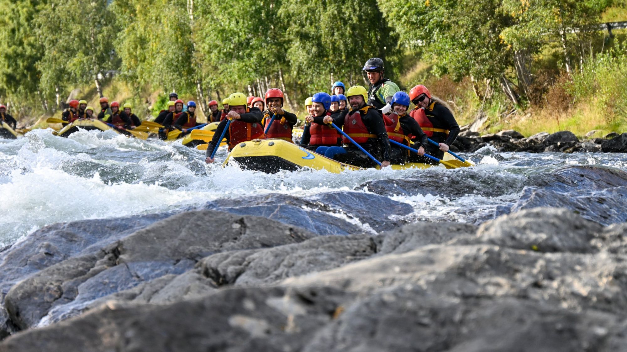 DI team rafting together on the Sjoa river