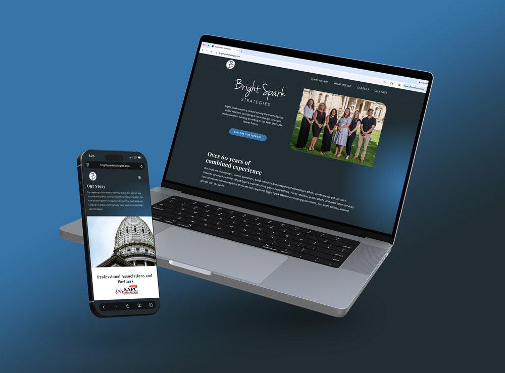 mockup of Bright Spark Strategies' website on a laptop and phone