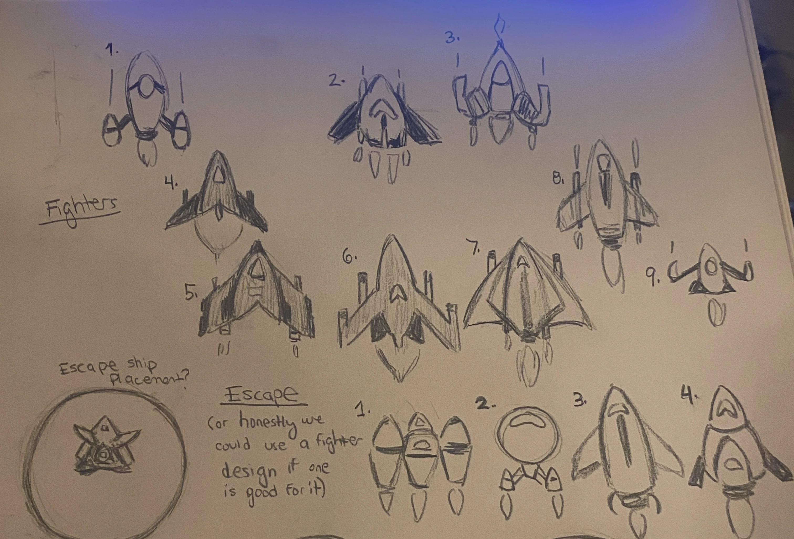 Sketches for the enemy fighter ships and escape ships.