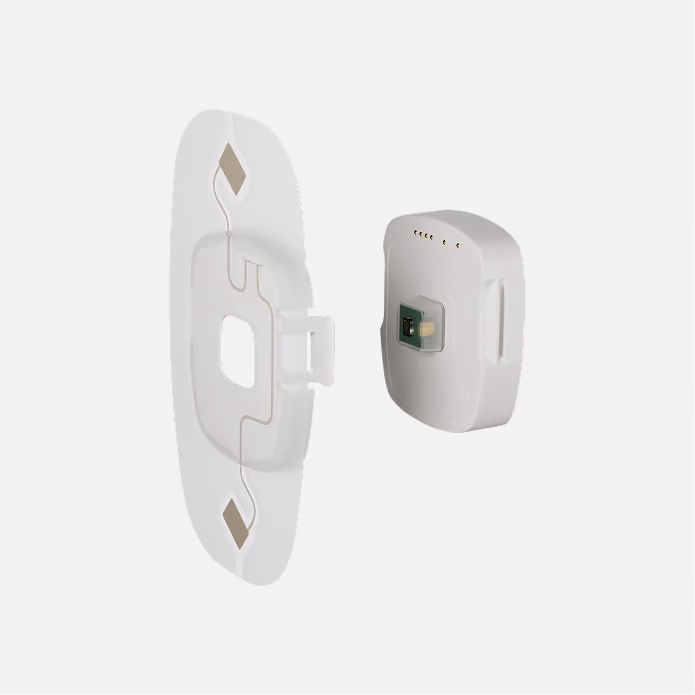 3D render of the SANSA device separated from its adhesive patch, angled view