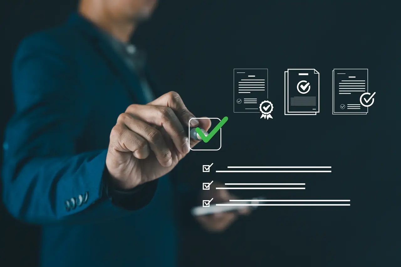 A businessman ticking a checkbox beside approved document icons, representing a procurement shortlist decision