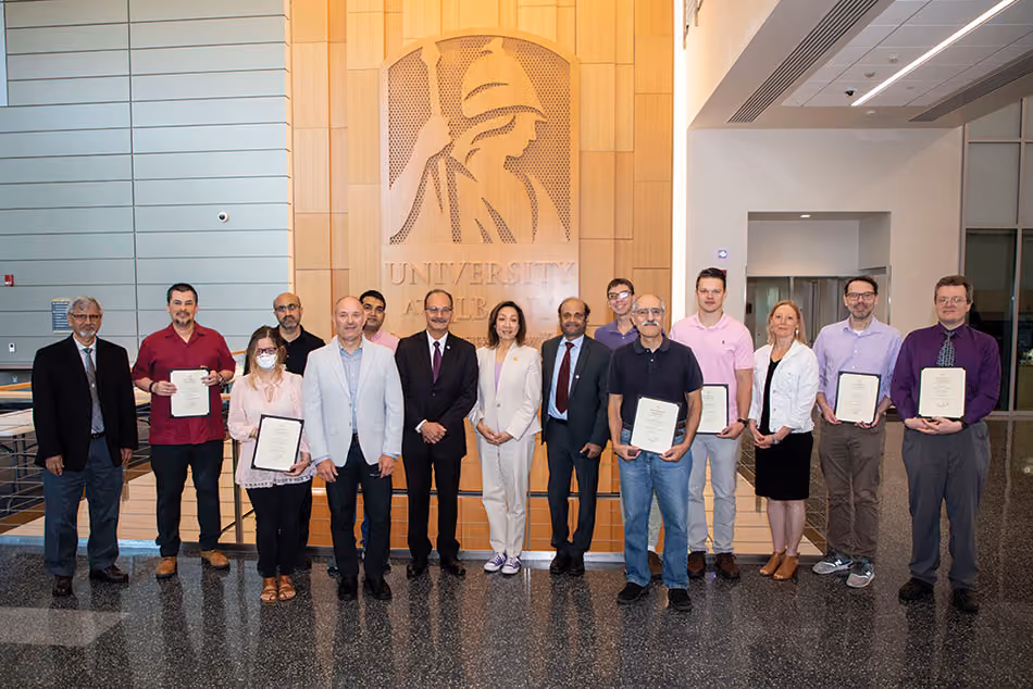 UAlbany Inventor honorees stand with President Rodríguez, Provost Kim and Vice President Kesavadas following the recognition ceremony. Photo: Patrick Dodson, BA ’12
