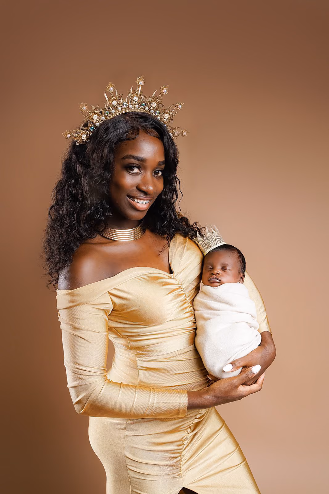 Grace Claxton holds son Thyree.