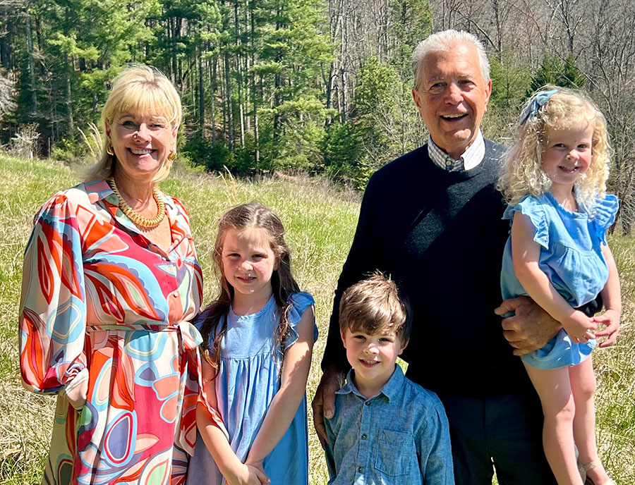Pape with his wife, Barbara, and their grandchildren — a family that might not have existed without the help of Five Quad.