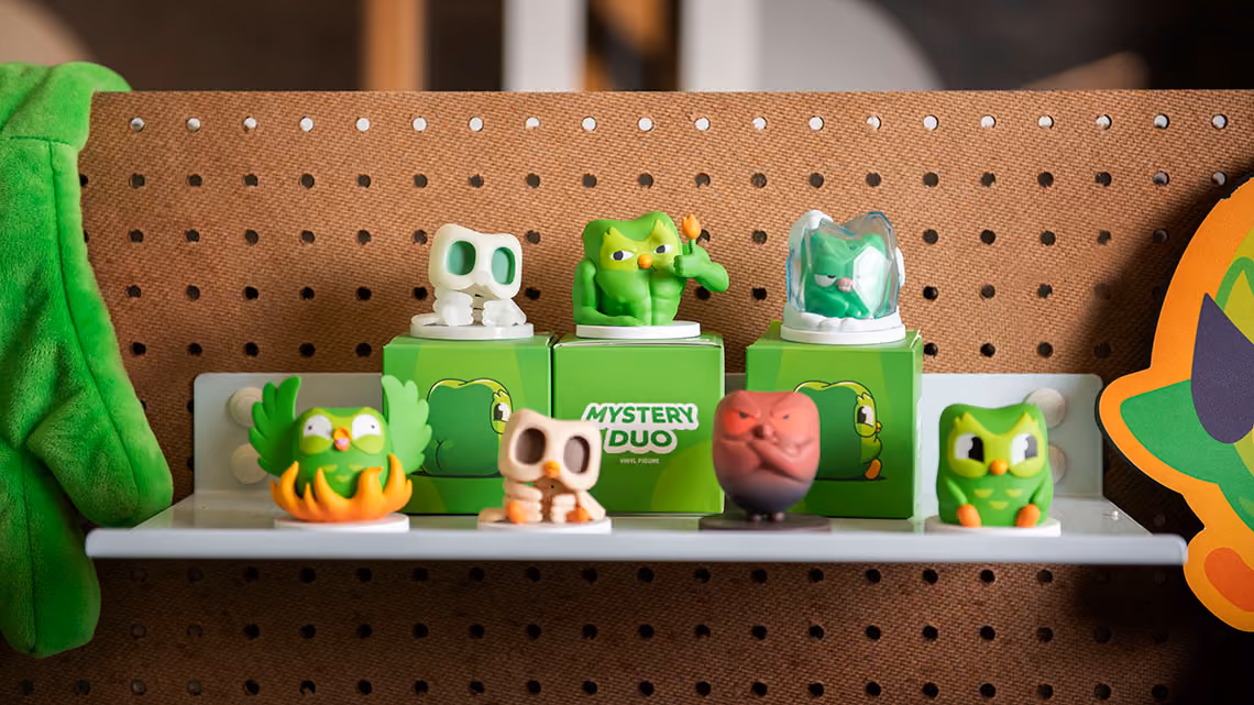 A shelf with Duo figurines from surprise packs.