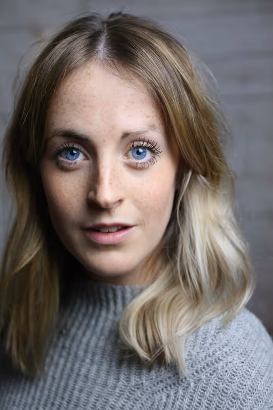 Philippa Hogg as Trainer