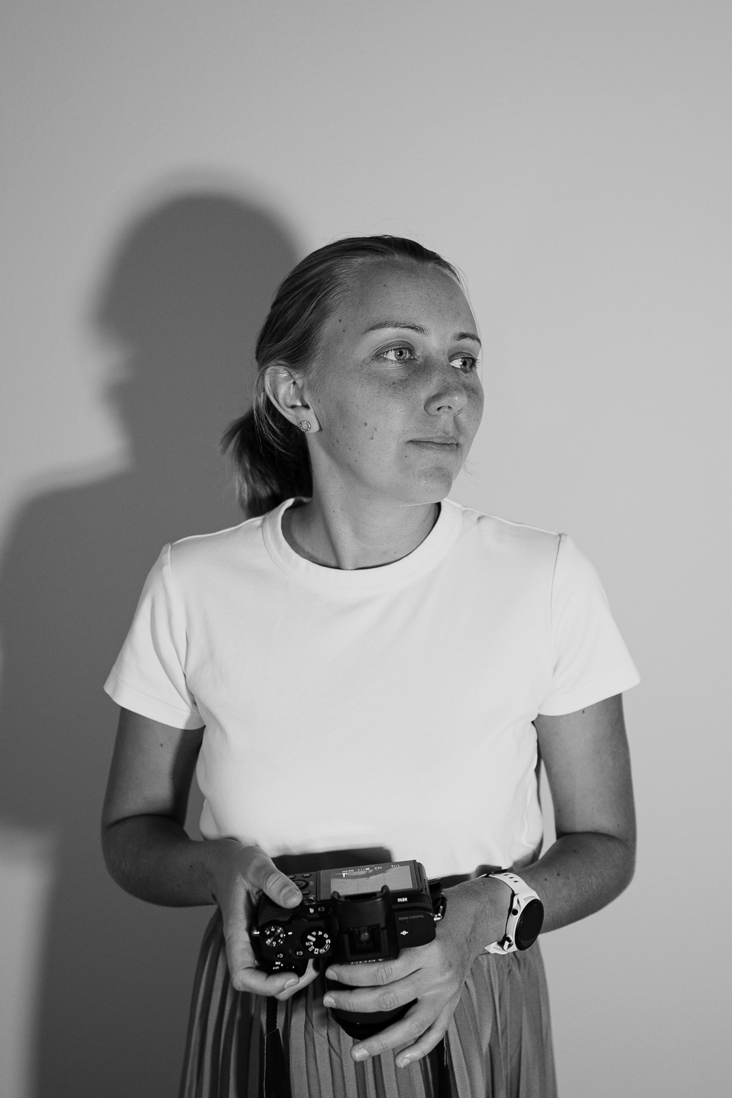 Black and white studio portrait of Katy