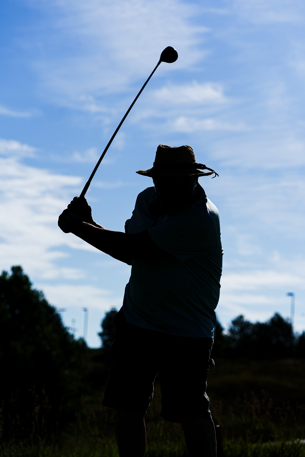 Silhouette of a golfer's backswing