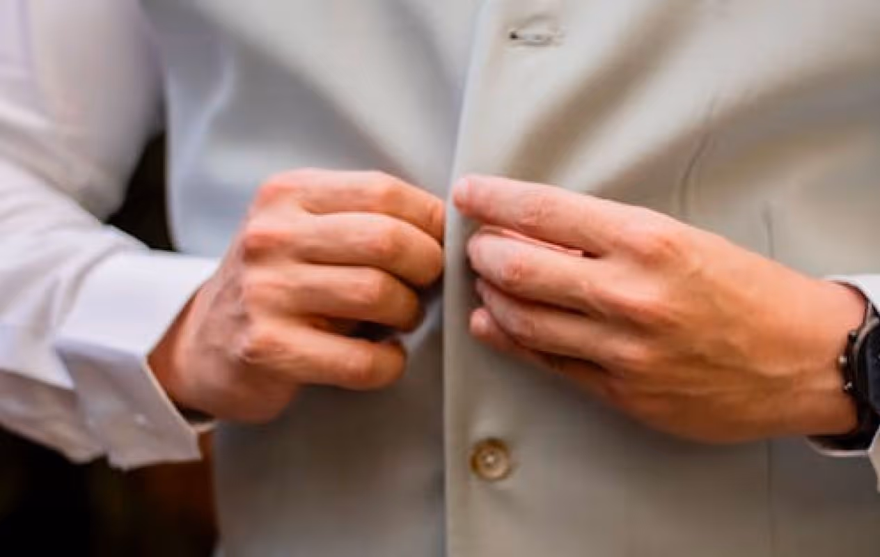 A close up of a person wearing a watch.