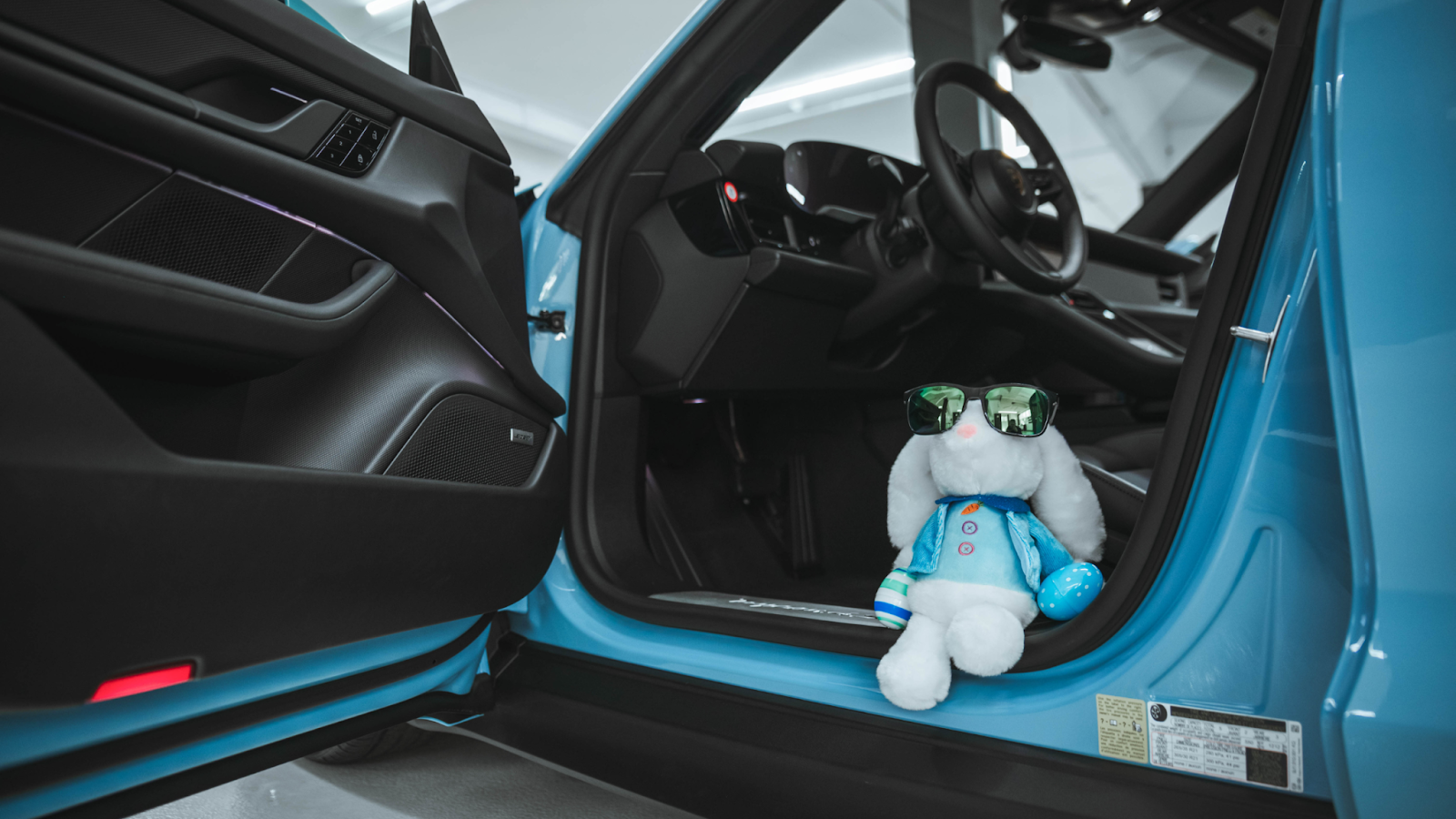 Freshly detailed car interior in Toronto with spotless door panels and clean vehicle floor after professional detailing.