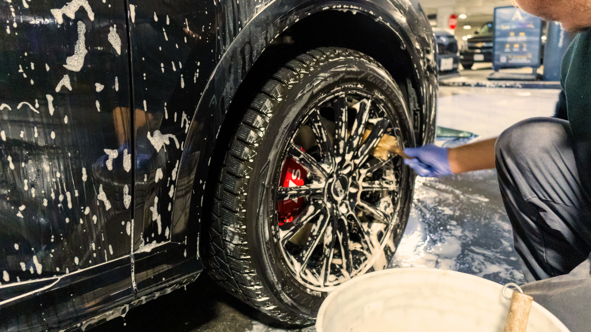 Wheel and brake cleaning with detailing brush at ALPHASHINE, exterior detailing service in Toronto