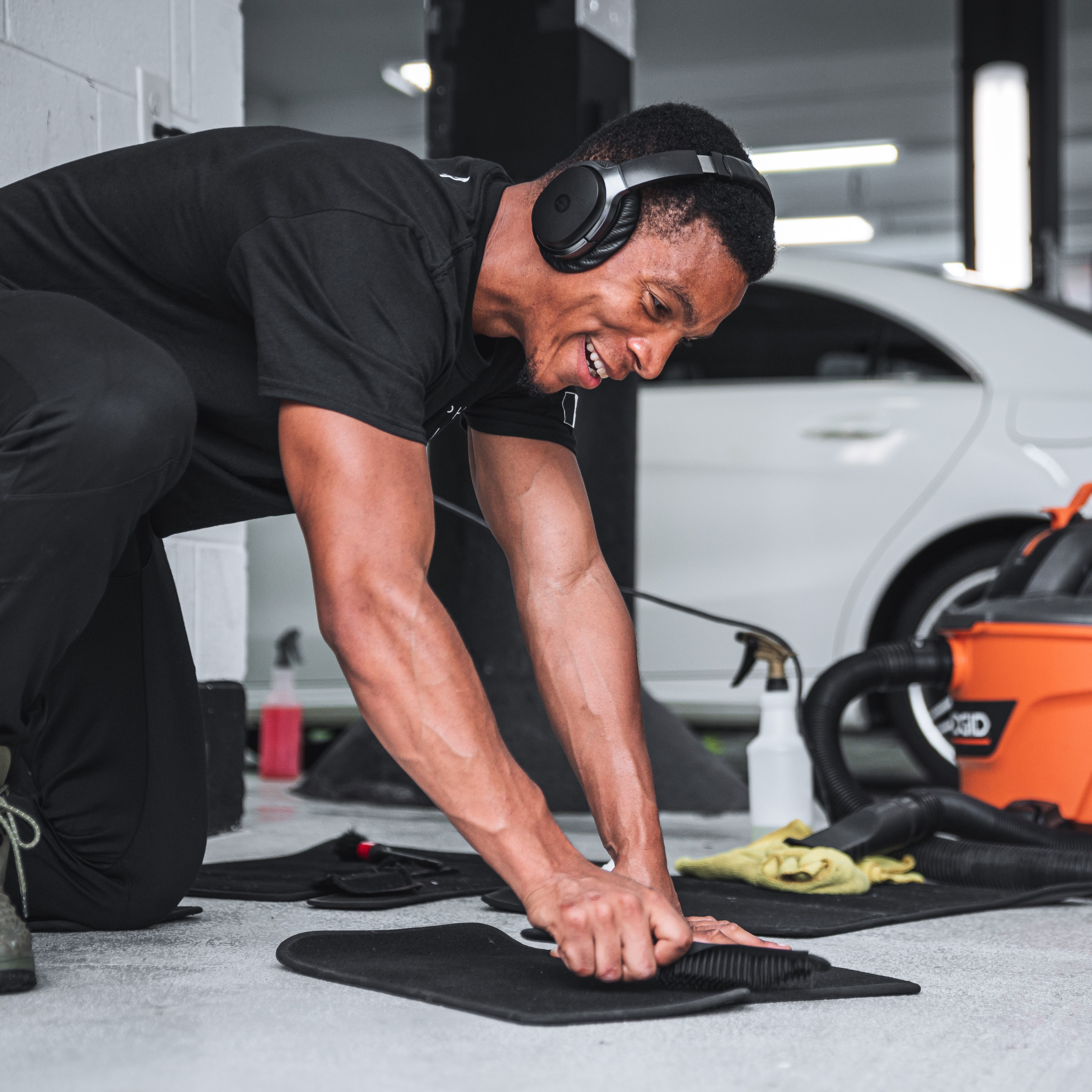 alphashine employee cleaning carpet