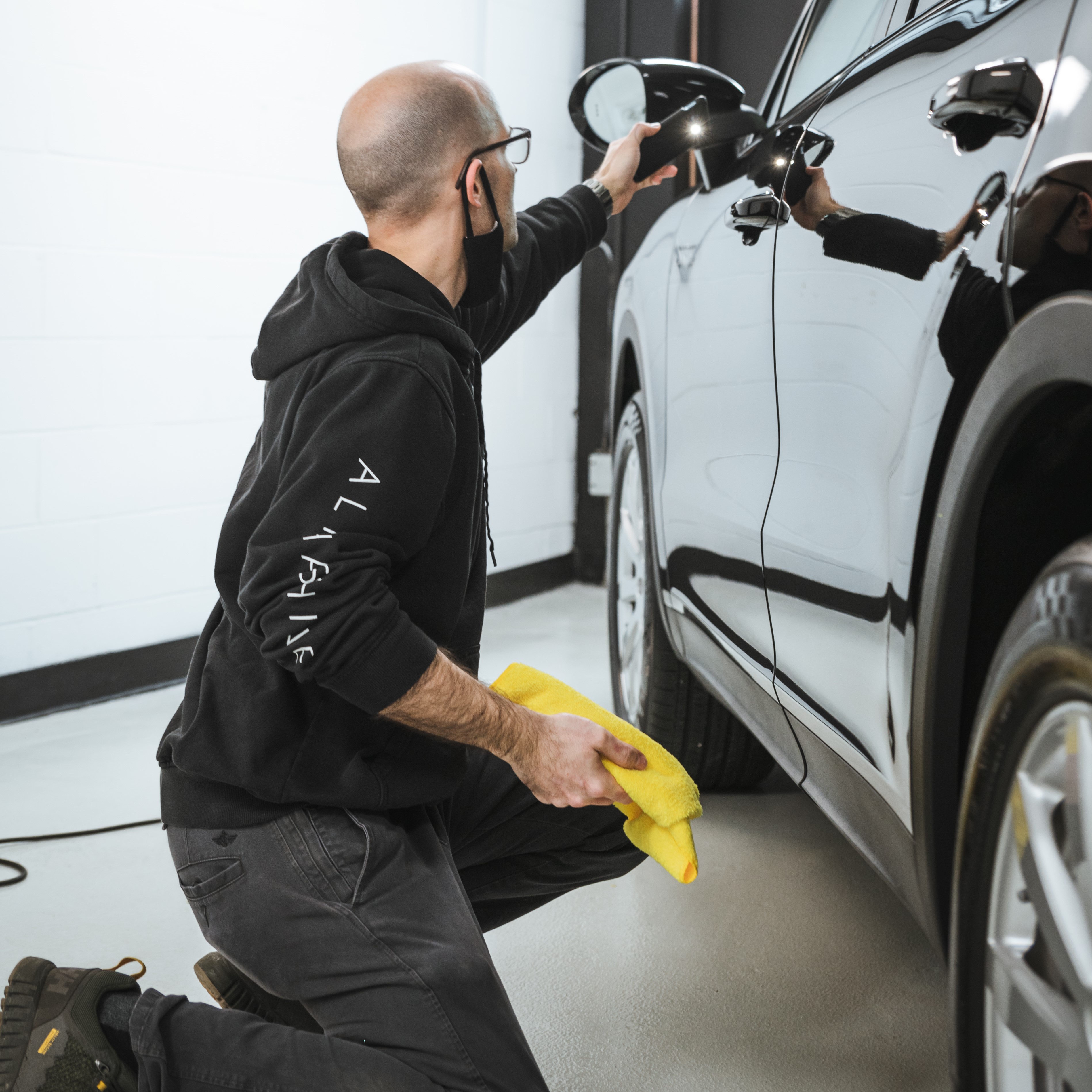 car being polished by alphashine employee
