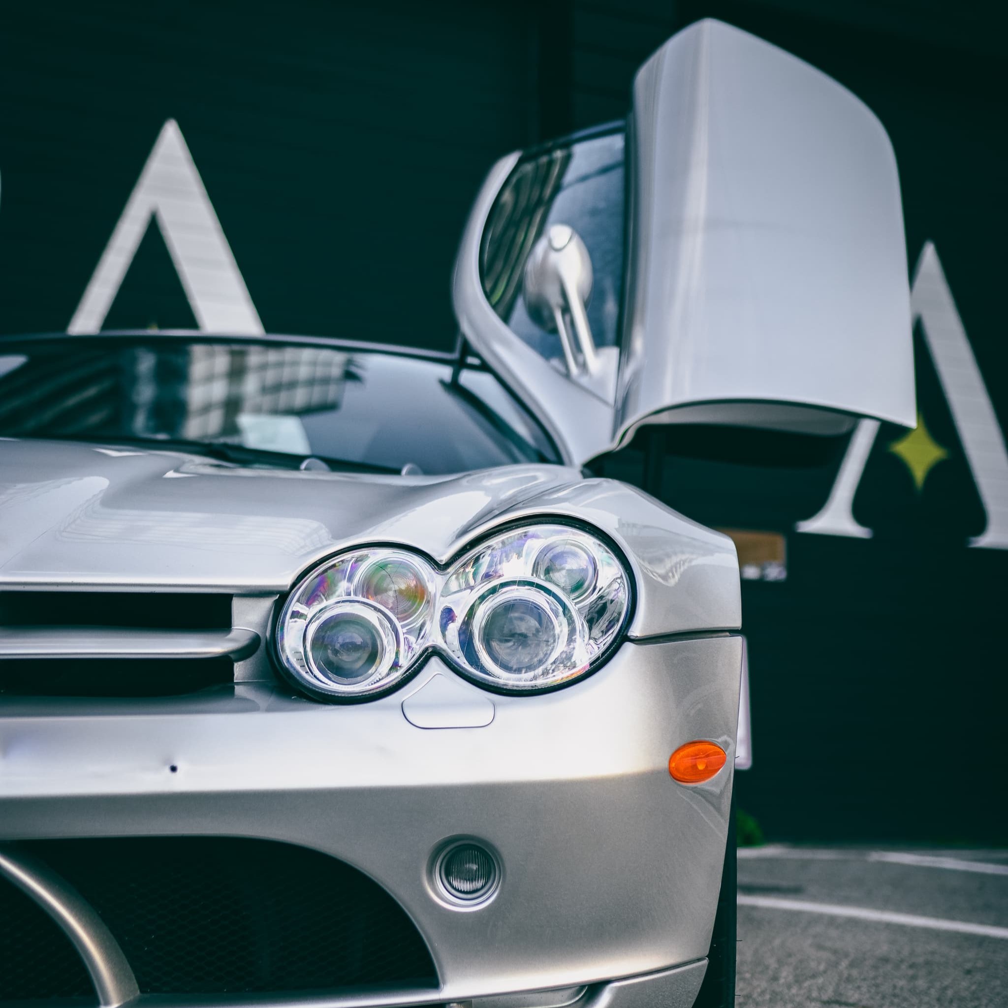 Headlight restoration done by Alphashine on a silver car.