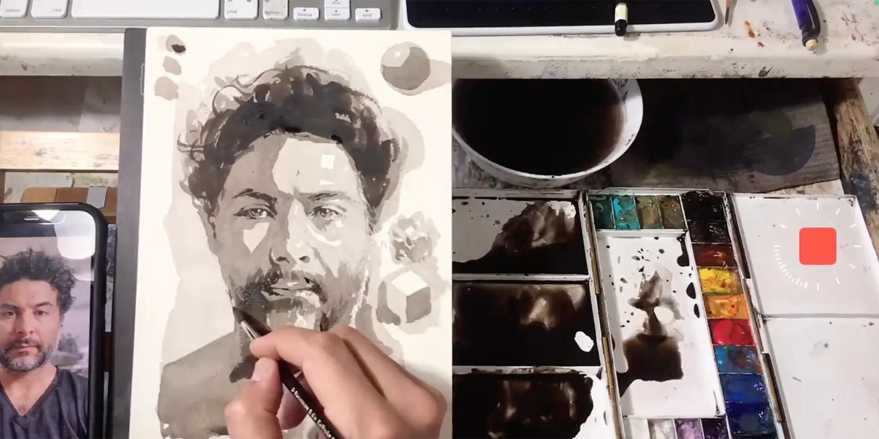 a person holding a picture of a person