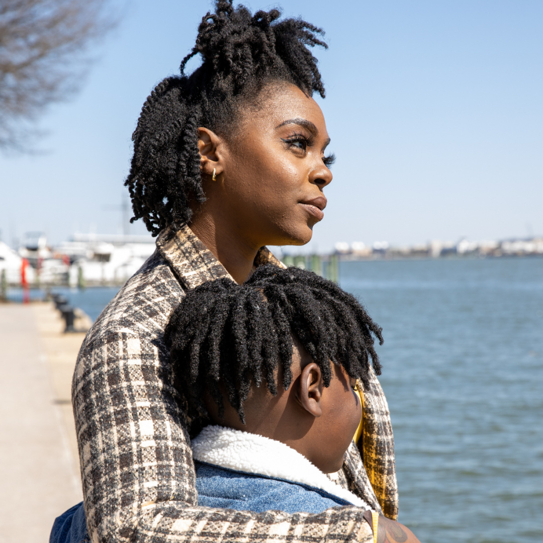 Portrait of a woman smiling in sunglasses