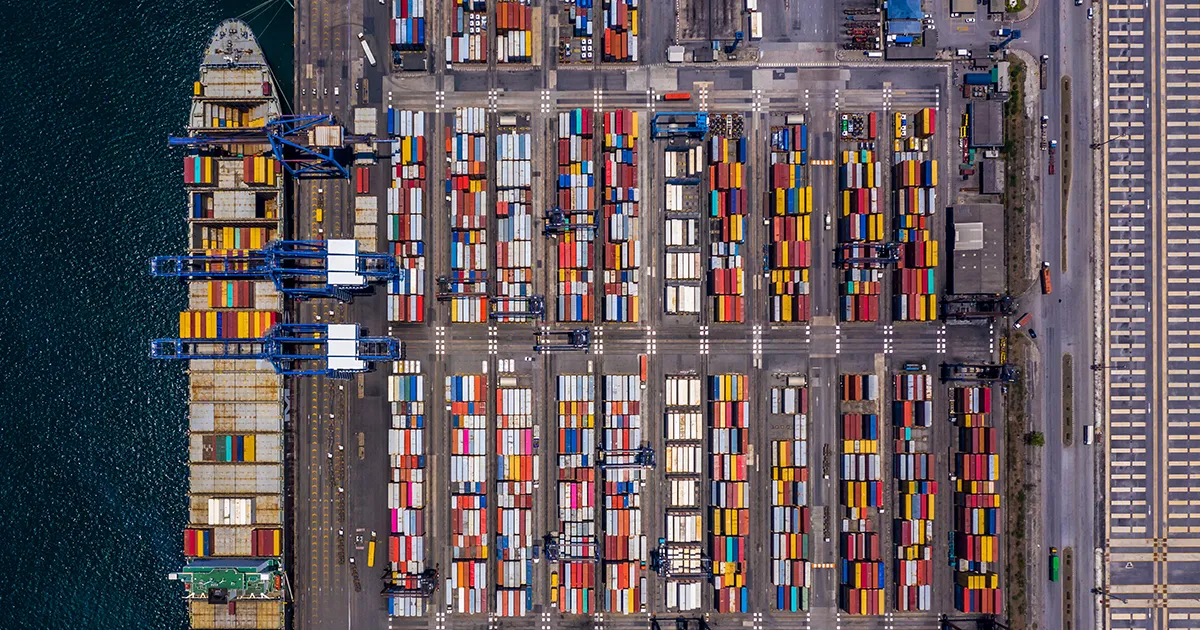 An aerial image of containers on a large transport ship