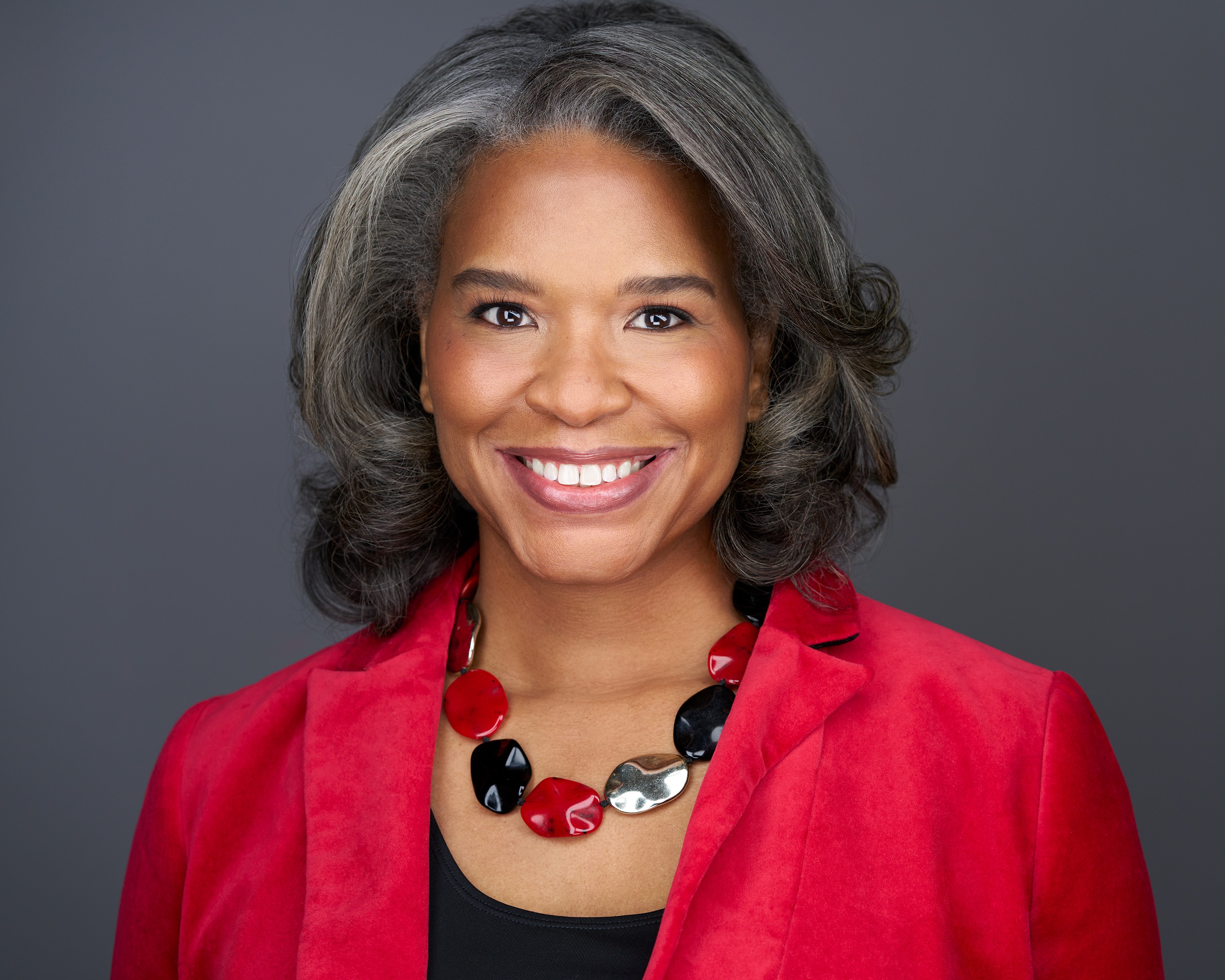 Executive headshot of woman, senior professional portrait