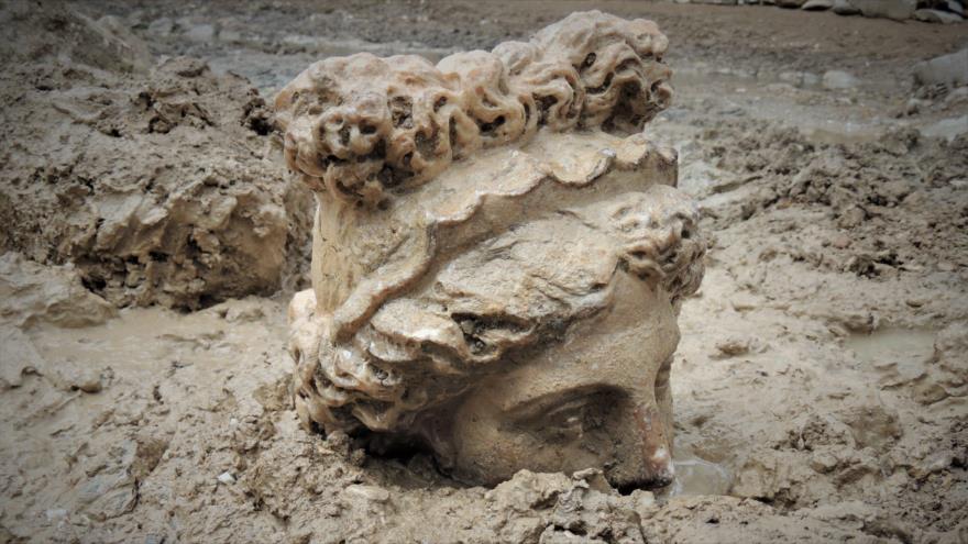 Archaeologists found the statuary heads of Aphrodite and Dionysus in the ancient city of Aizanoi. (Image credit: Head of Aizanoi Excavation / Handout/Anadolu Agency via Getty Images)