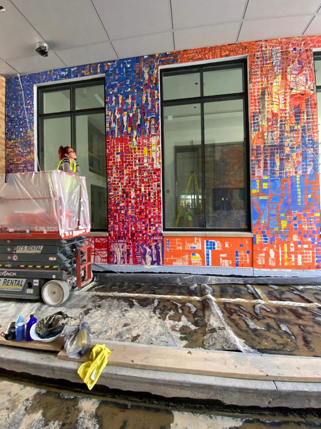 Mónica, Esteban’s wife and also an artist, working alongside him on the project.