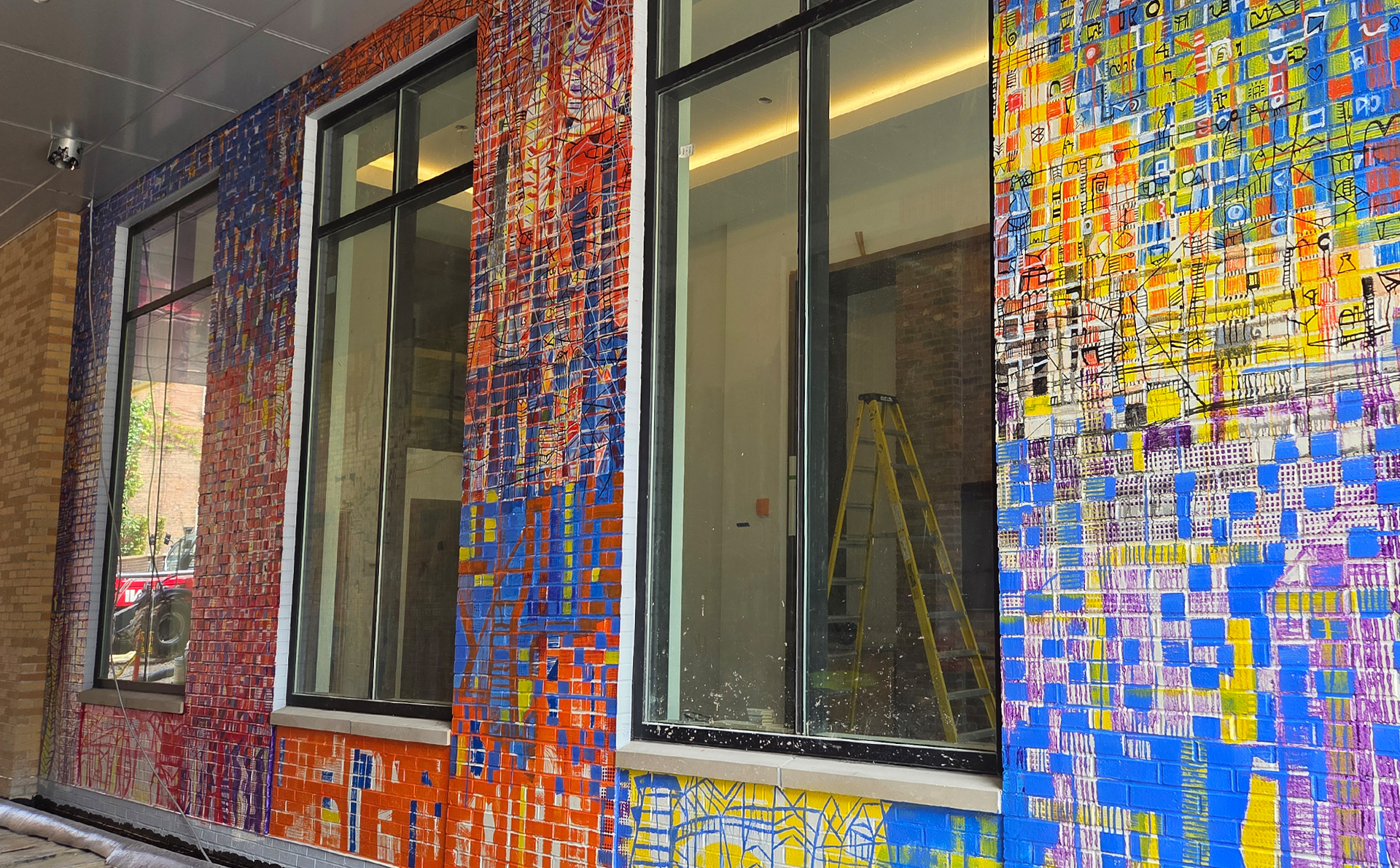  Nearly completed sections of the Freeport Row mural.