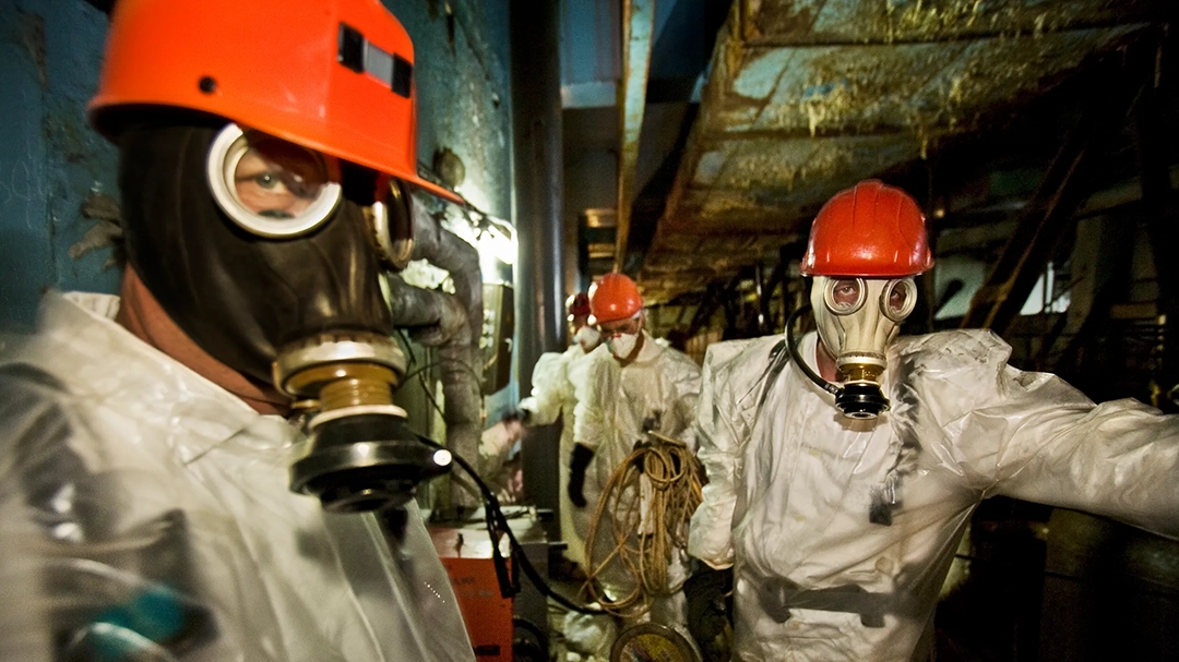Workers venture close to the damaged core of reactor No 4 in 2005, where they can spend only 15 minutes a day. © Gerd Ludwig, 2005