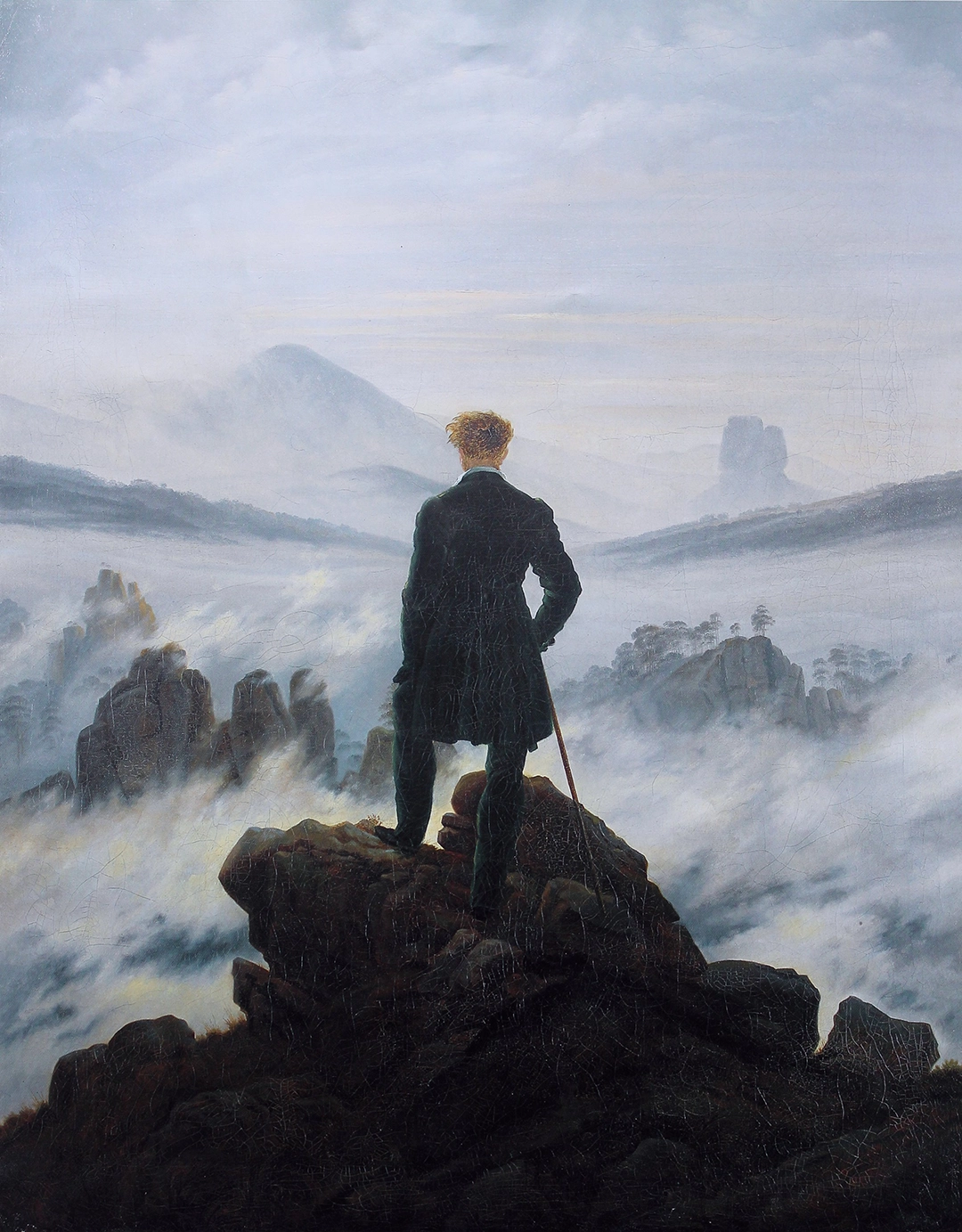 Caspar David Friedrich (1774–1840). *Der Wanderer über dem Nebelmeer*, um 1818 (unsigniert). Öl auf Leinwand | 74.8 × 94.8 cm | Hamburger Kunsthalle, Hamburg, Deutchland. Wikipedia