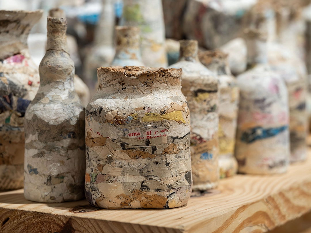 Bacchanalia (detail), 2022, Compressed printed papers | 60 x 144 x 36 in