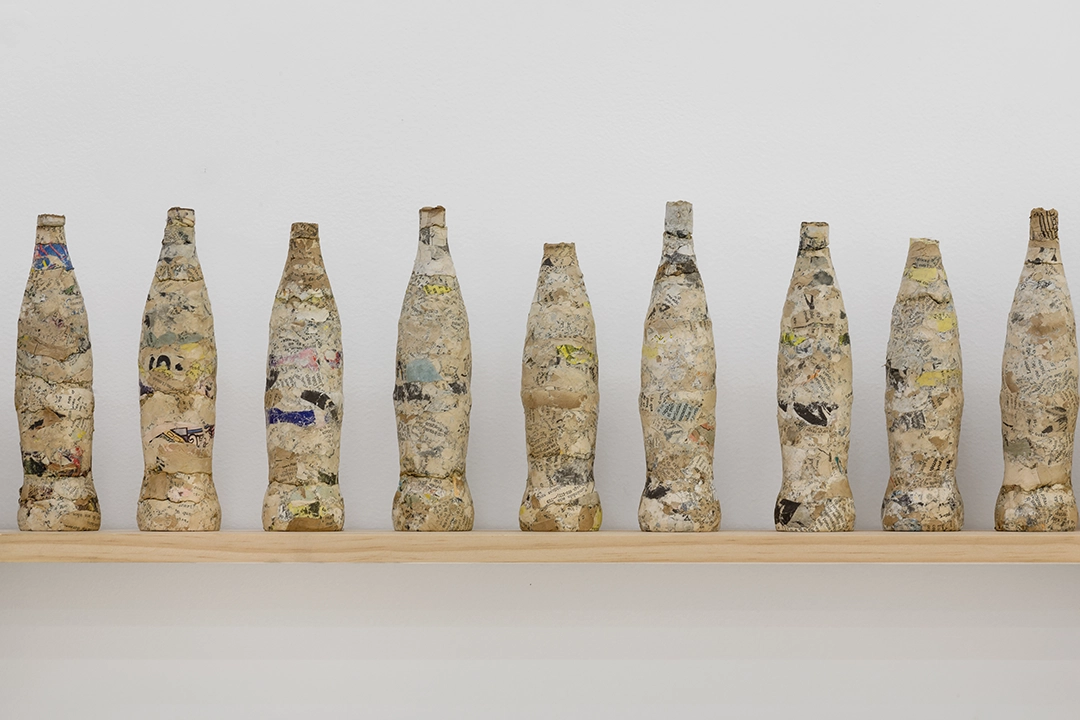 Coca Cola del olvido, 2017 (detail) | compressed paper and wood, (books from the artist's personal library in Cuba, including materials used during his high school and college education)