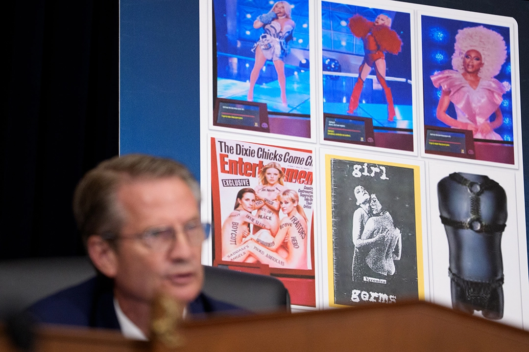 Chairman Rep. Tim Burchett displays images from an exhibit as Dr. Anthea Hartig appears during a congressional oversight hearing.