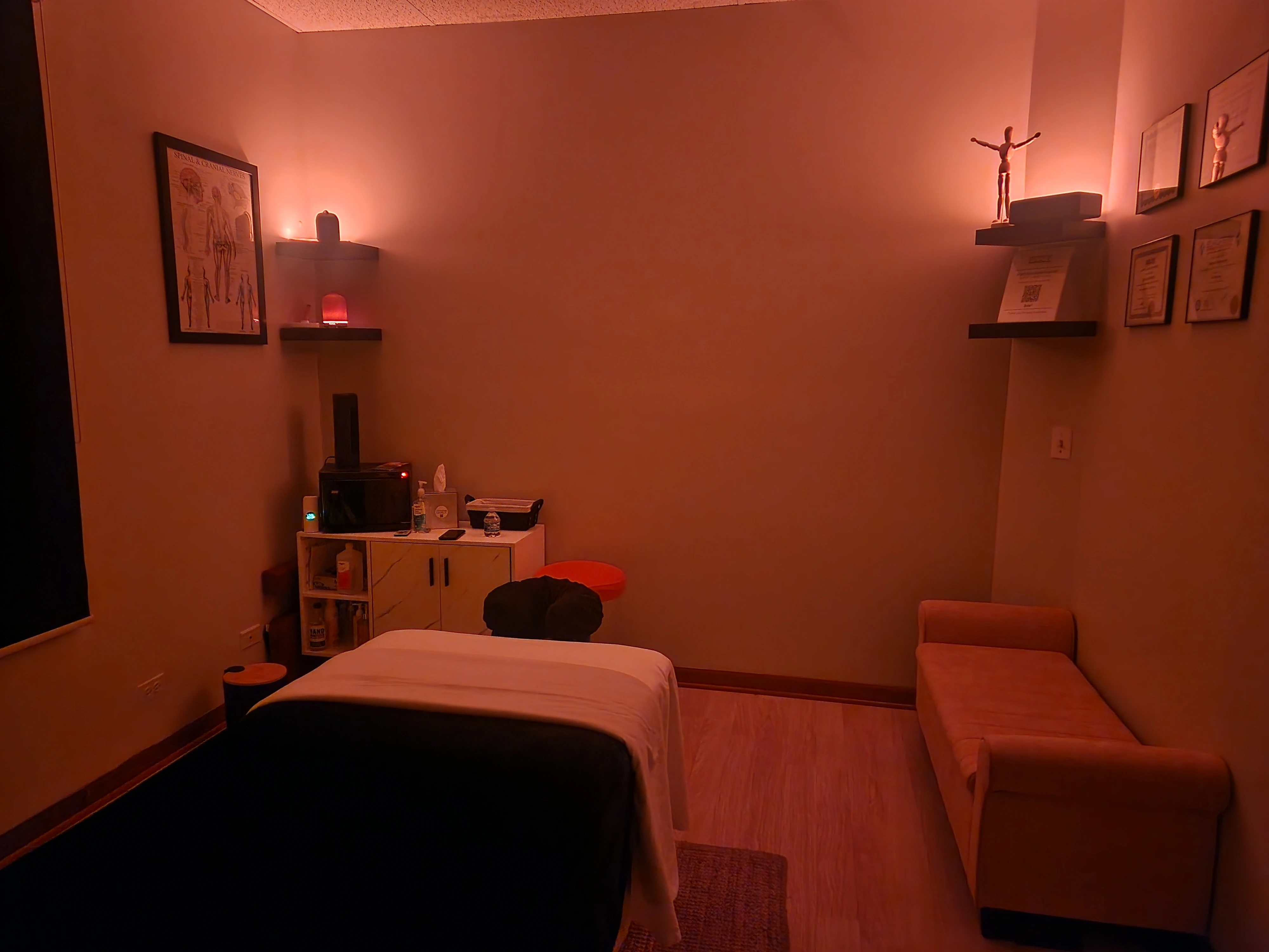 A Massage Cult studio room with table.