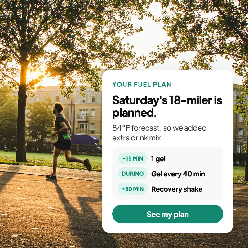Runner in a park with a fuel plan card for Saturday's 18-mile run