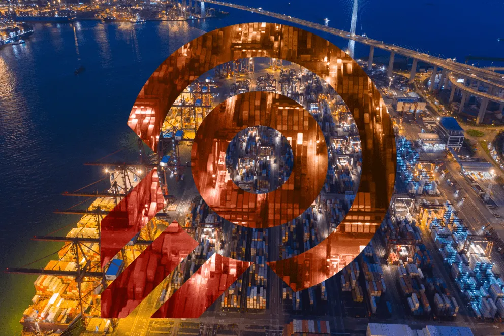 Aerial nighttime view of a busy illuminated shipping port with containers and cranes, overlaid with a semi-transparent red spiral graphic.