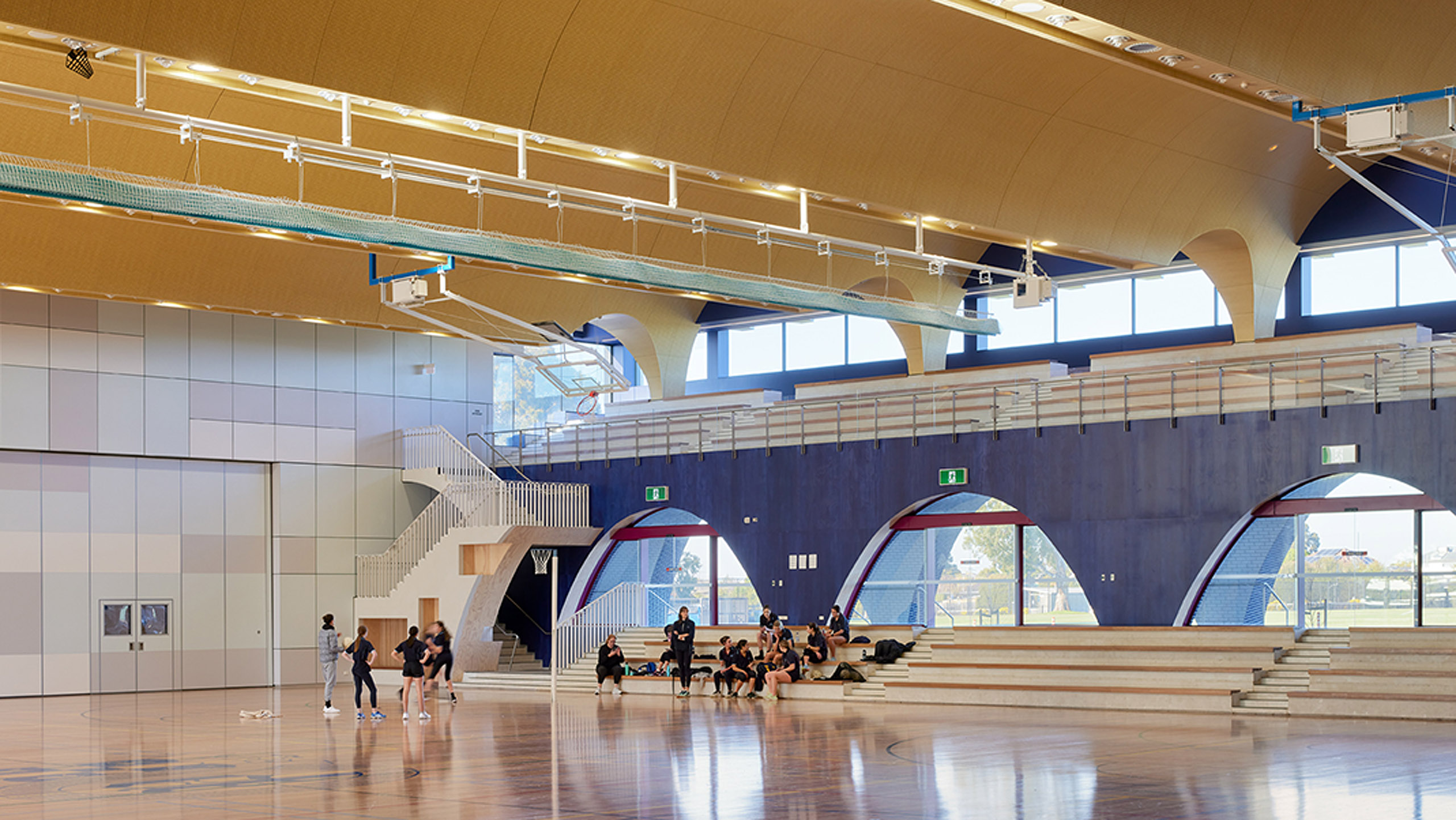 Blockout and Transparent Roller Blinds in a School.