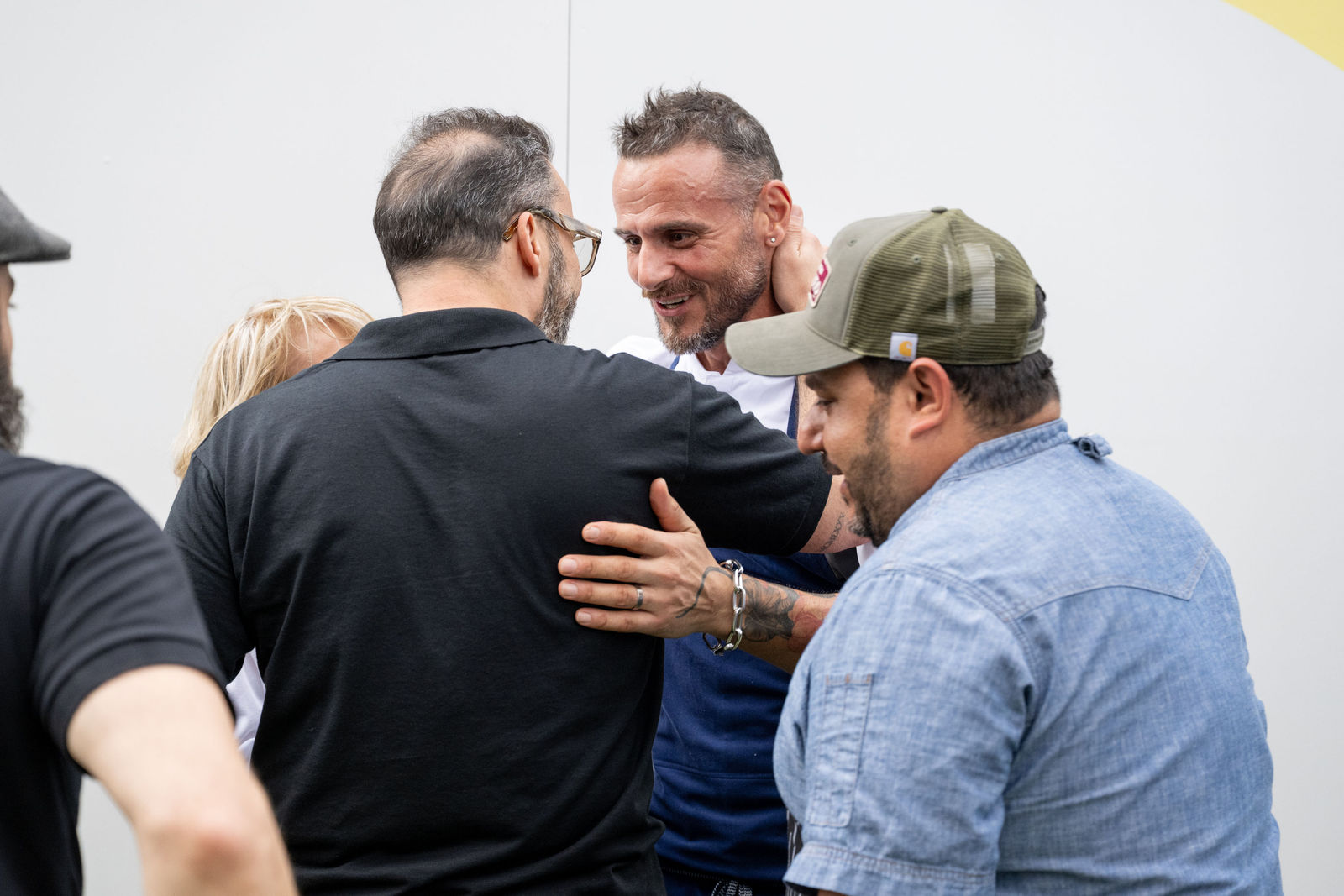 Chefs and team members greeting each other warmly at Capital One Center Culinary Week 2026