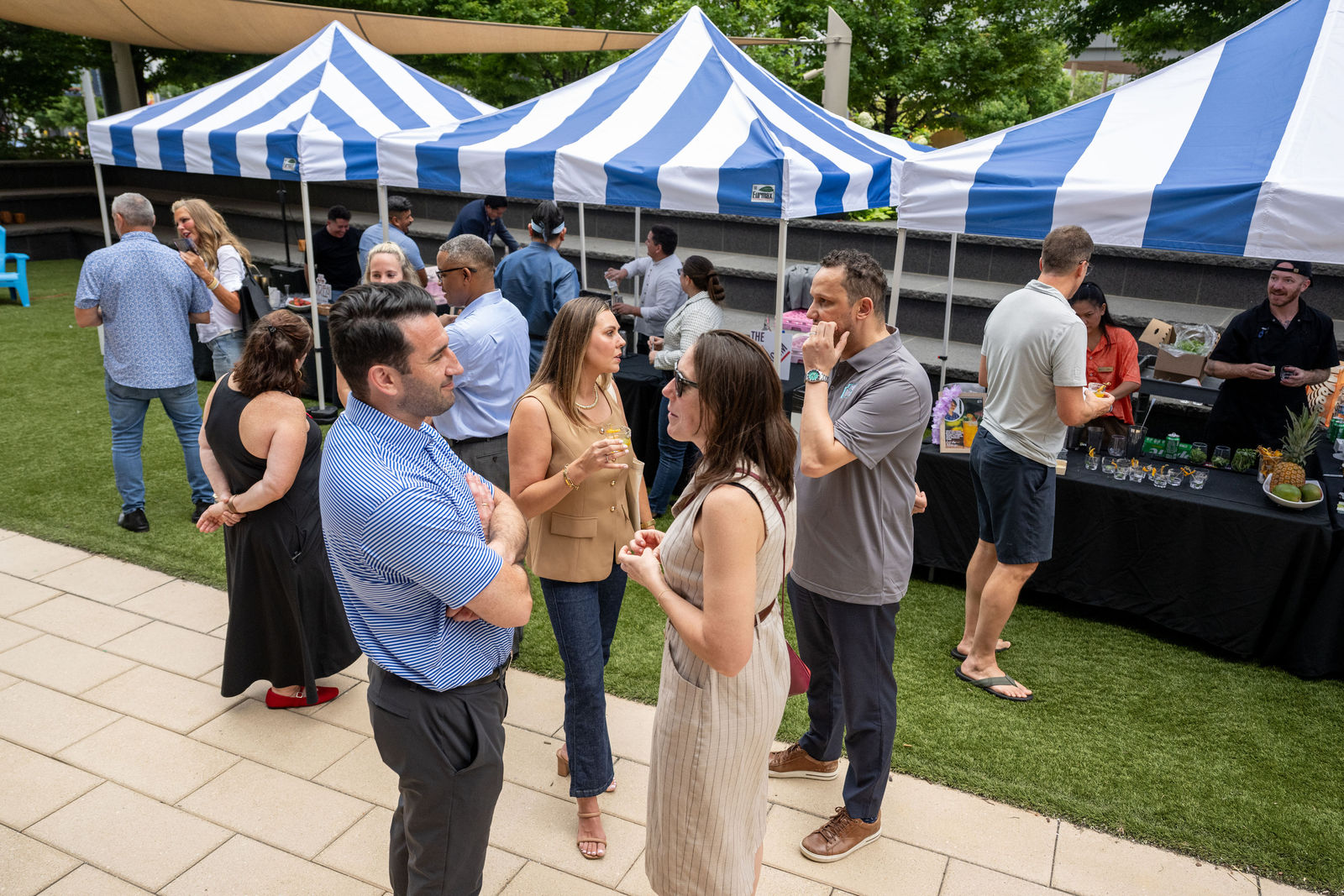Guests networking and enjoying cocktails at an outdoor Cocktail Contest event at Capital One Center Culinary Week 2026