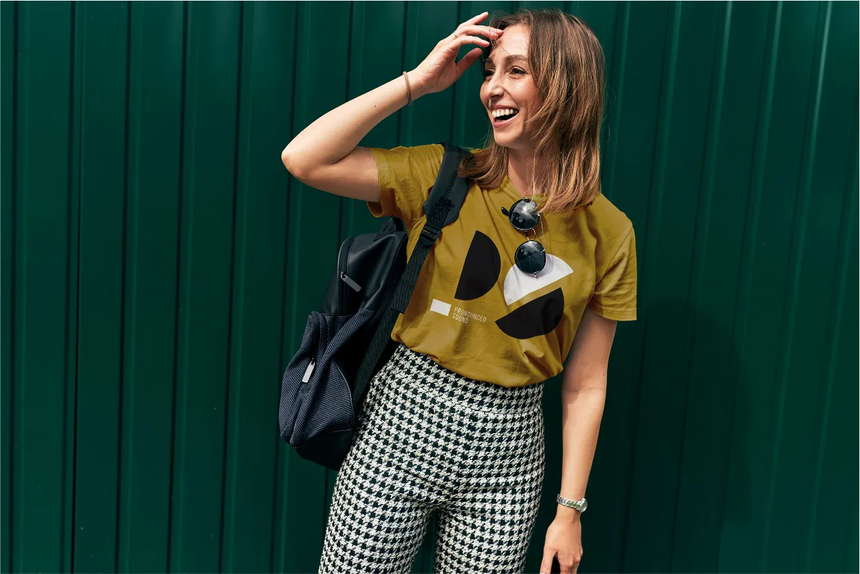 pronounded sound photo of woman wearing yellow t shirt with logo