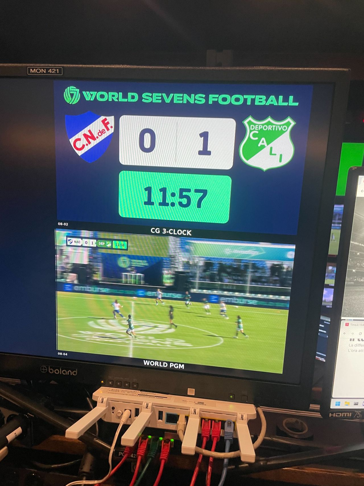 NEP production facility with audio mixing and broadcast monitors