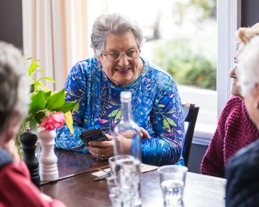 Consumers enjoying conversation at a cafe