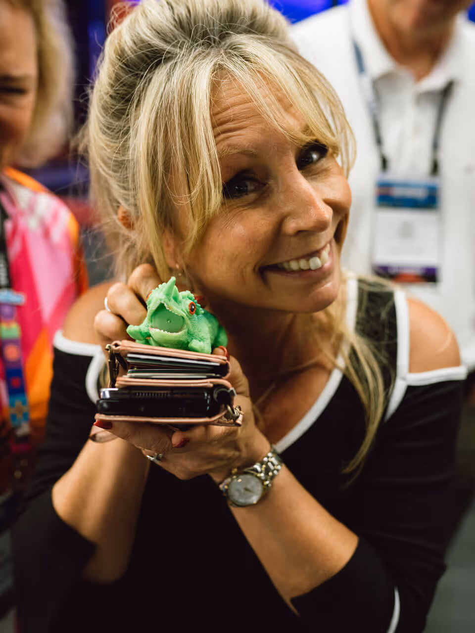 Elizabeth Francisco holding a green ROI